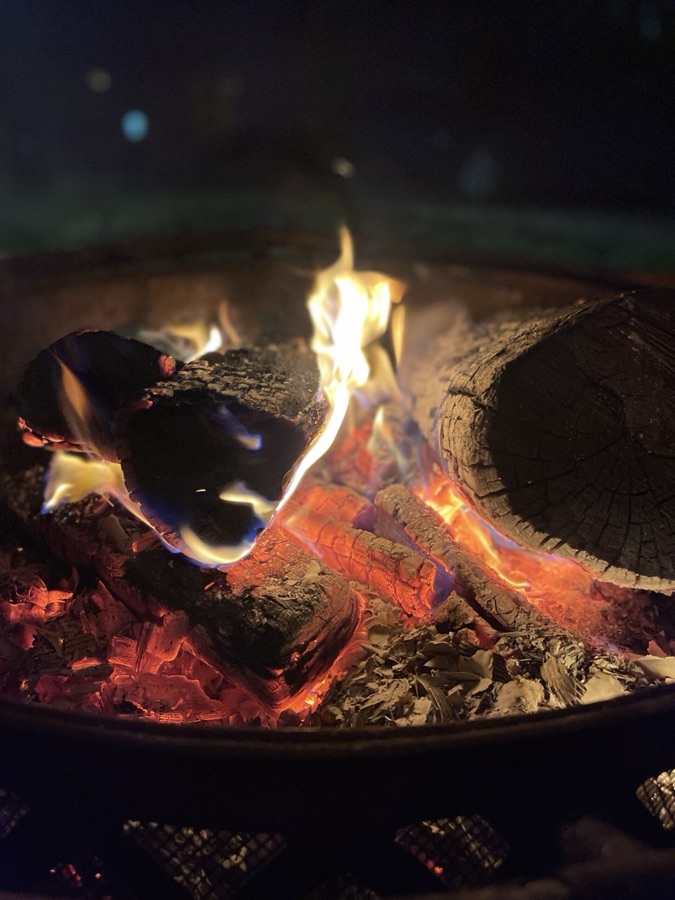 Fire burning in a backyard fire pit