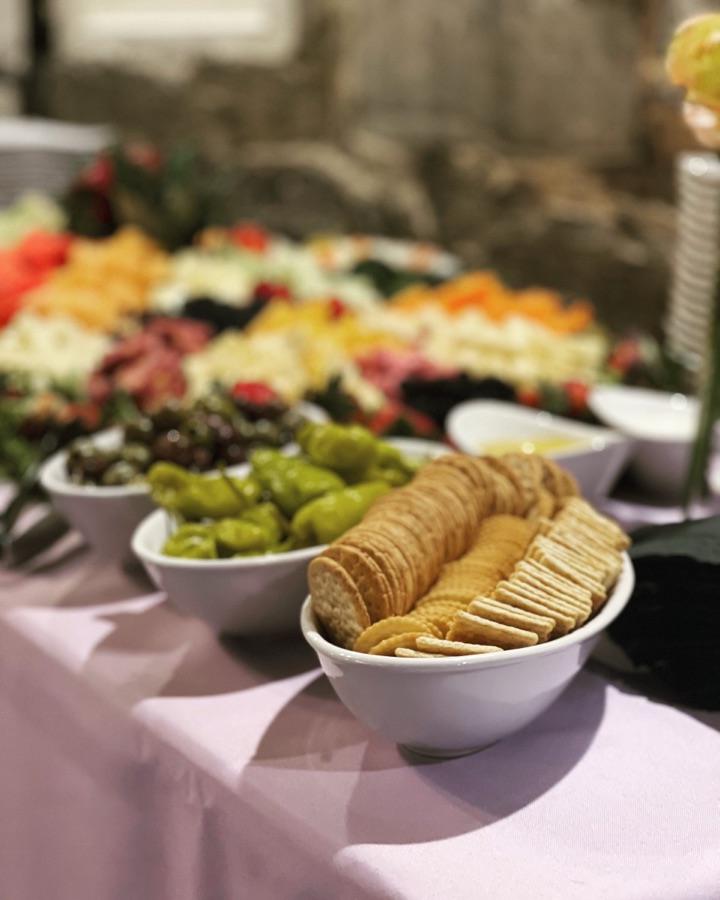 Catering spread with olives and crackers