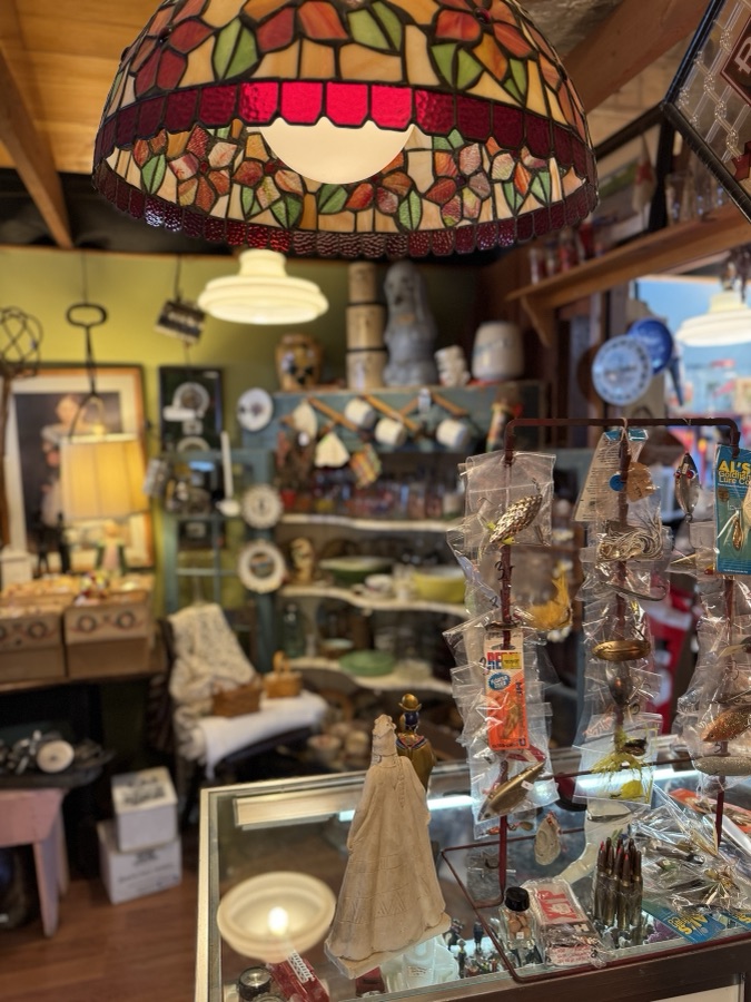 Gift shop interior with a stained-glass lamp