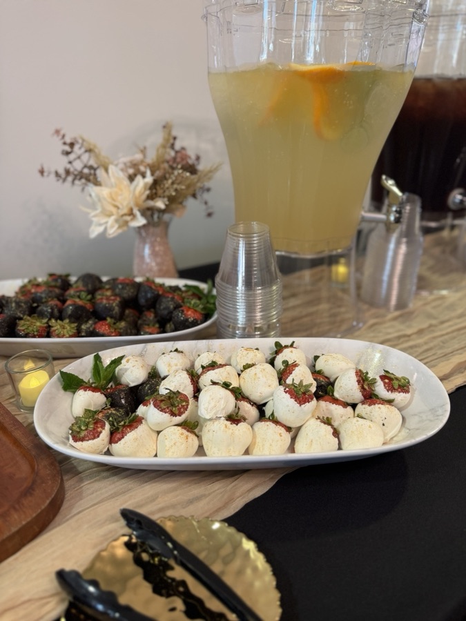 Chocolate-covered strawberries and lemonade at an event