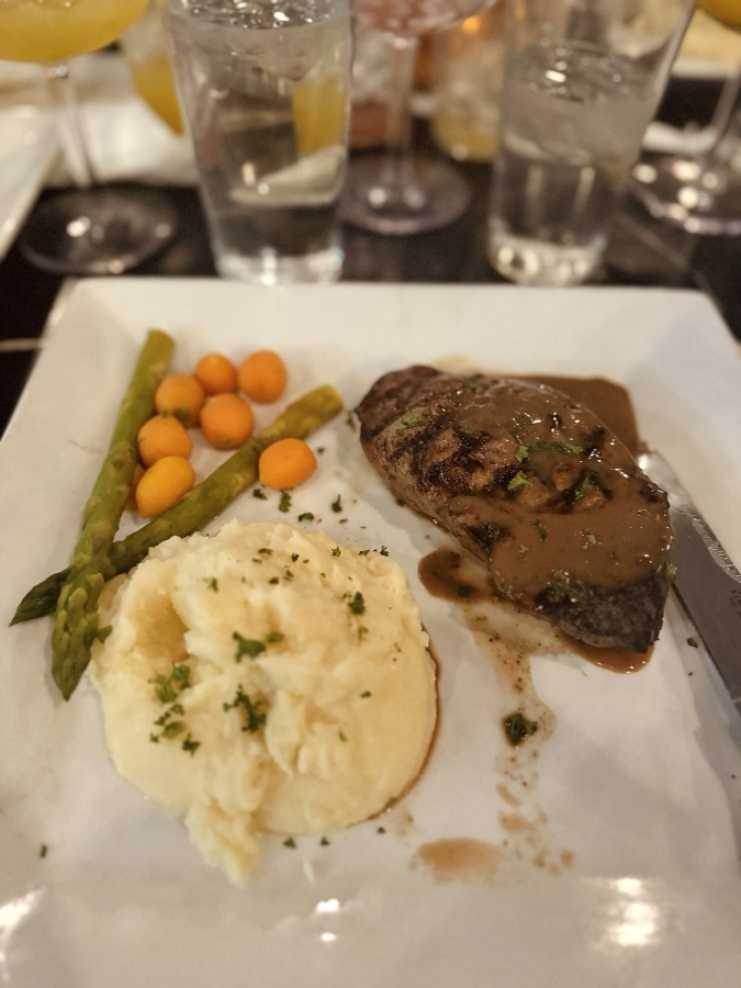 Steak with mashed potatoes, asparagus, and carrots